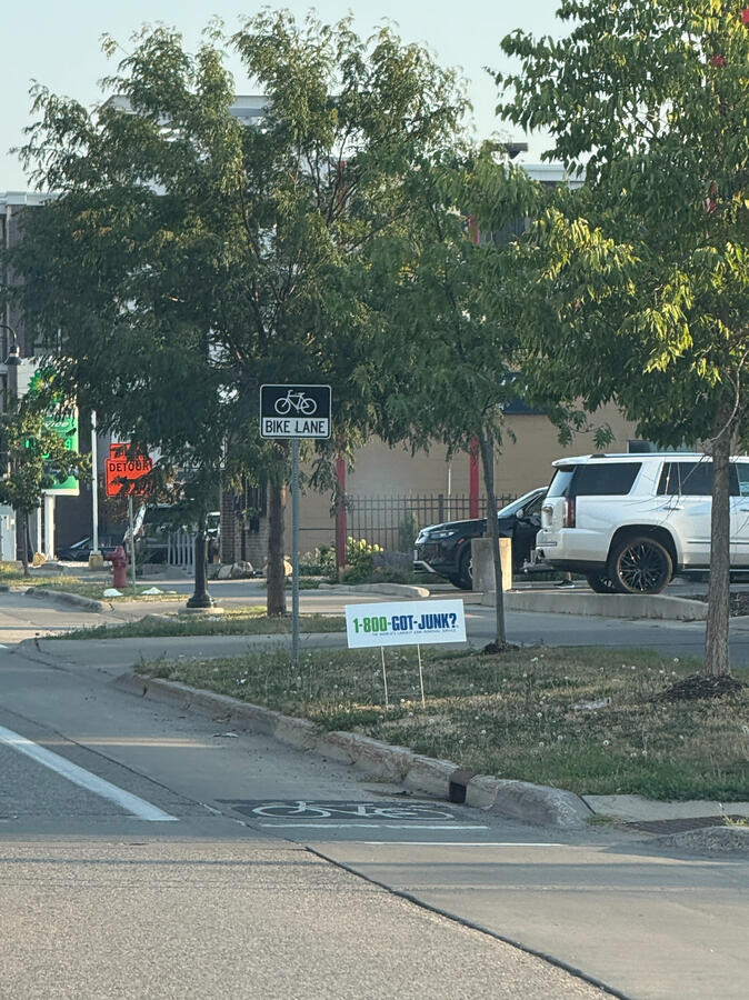 Advertising sign on a street corner